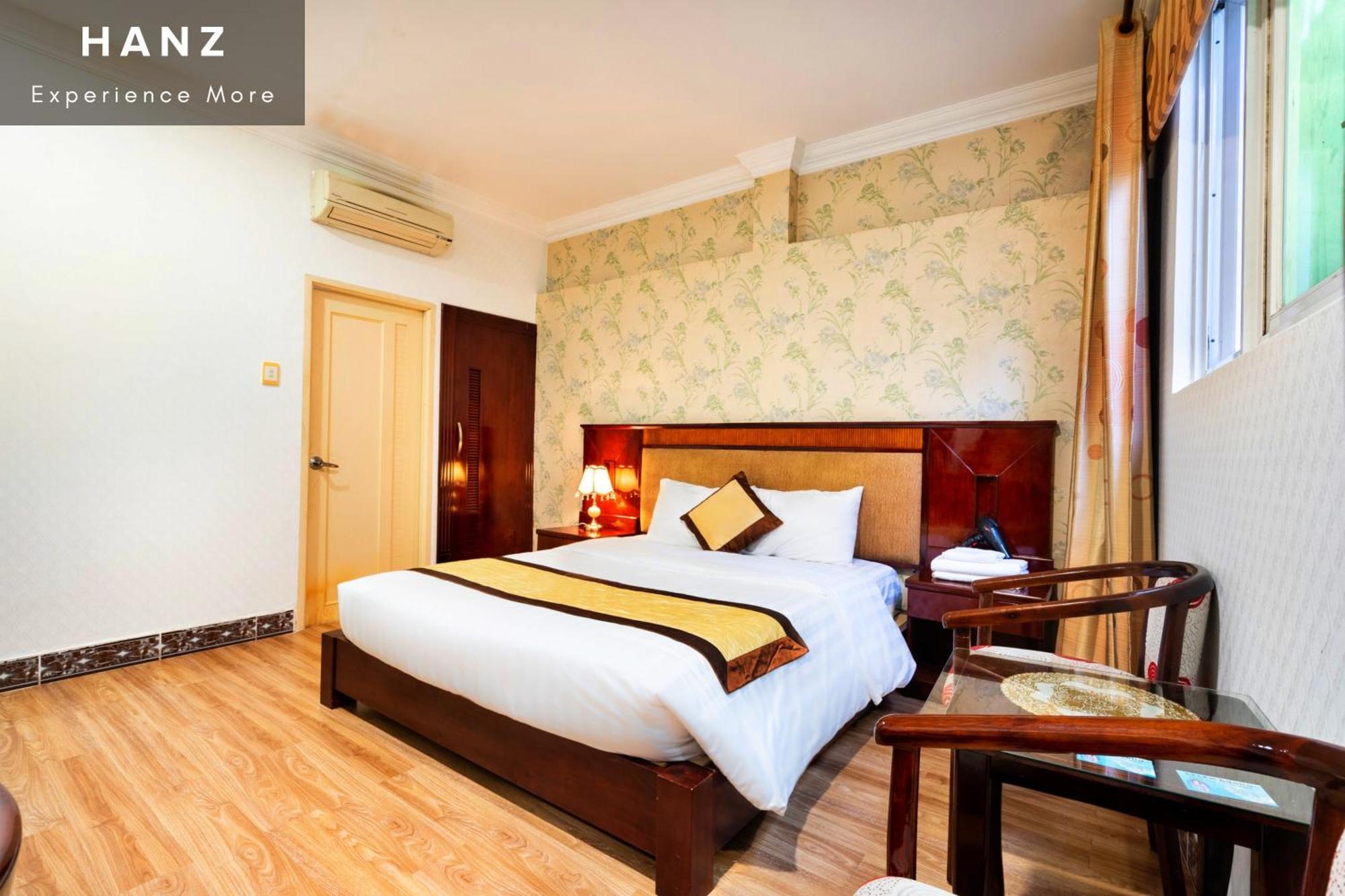 Cosmo Central Hotel Cidade de Ho Chi Minh Quarto foto