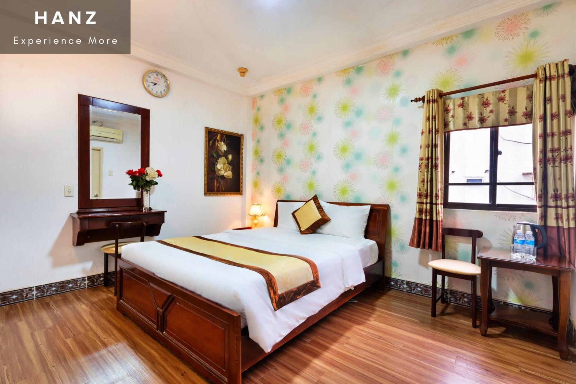 Cosmo Central Hotel Cidade de Ho Chi Minh Quarto foto