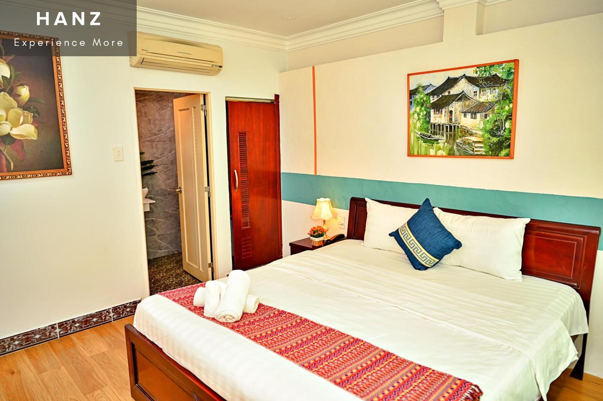 Cosmo Central Hotel Cidade de Ho Chi Minh Quarto foto