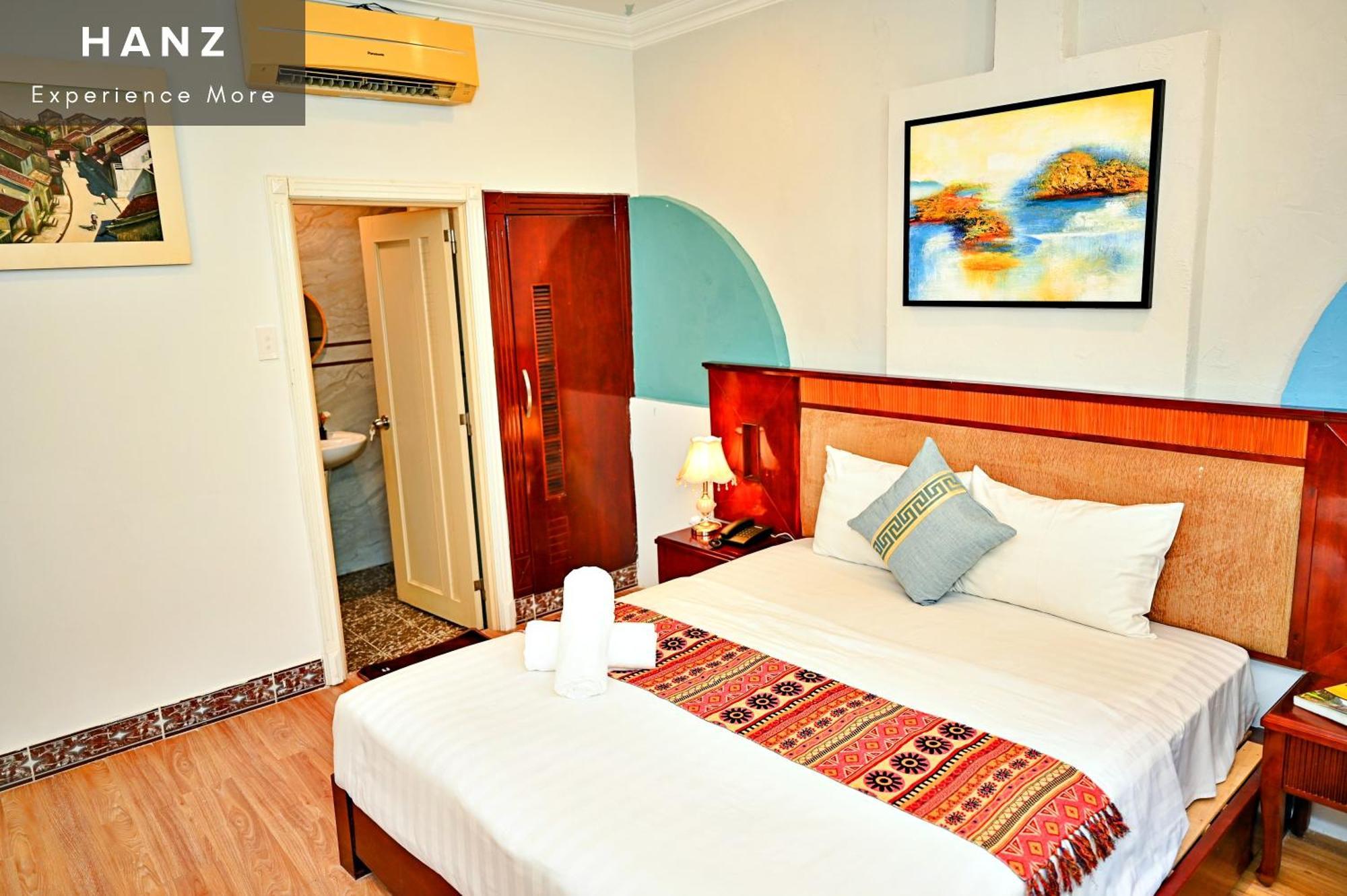 Cosmo Central Hotel Cidade de Ho Chi Minh Quarto foto