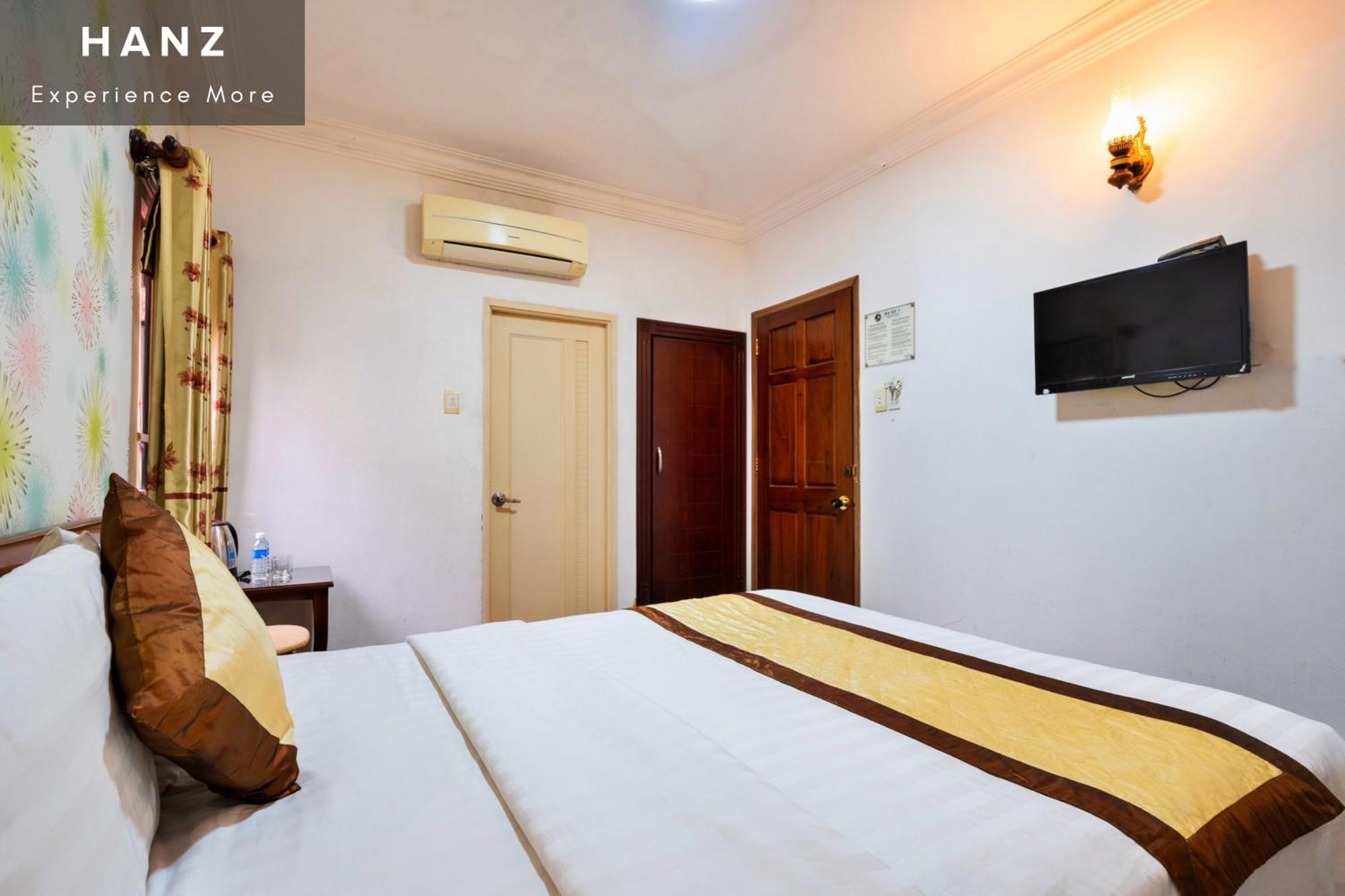Cosmo Central Hotel Cidade de Ho Chi Minh Quarto foto