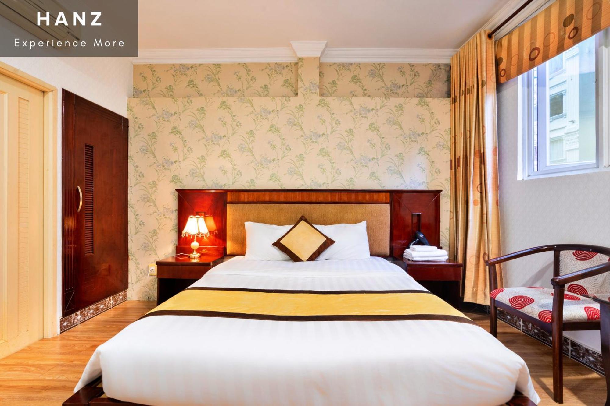 Cosmo Central Hotel Cidade de Ho Chi Minh Quarto foto