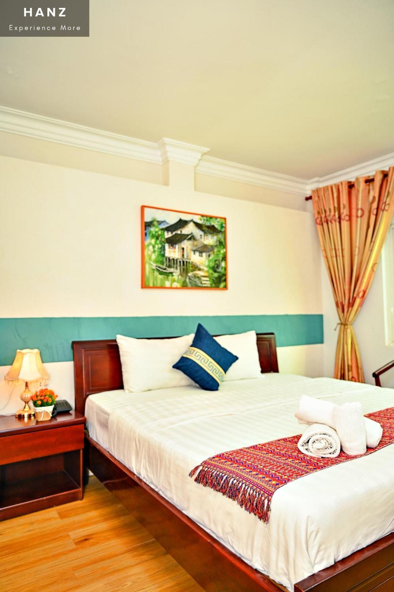 Cosmo Central Hotel Cidade de Ho Chi Minh Quarto foto